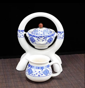 Lazy semi -automatic tea set ceramic home, flip the water out of the water