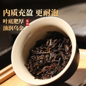 Pu'er ripe tea, Menghai old tree five-year-aged ancient tree tea, Yunnan seven-son cake.